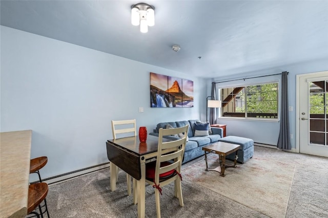 2545 Cattle Kate Cir Unit 3207, Steamboat Springs, CO 80487 - living room with baseboard heating and carpet