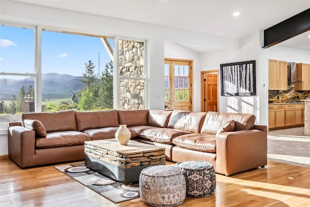 100 Gcr 4104, Granby, CO 80446 - living area featuring a mountain view, light wood-type flooring, vaulted ceiling, and recessed lighting