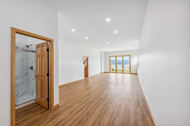 100 Gcr 4104, Granby, CO 80446 - unfurnished room featuring light wood-style floors, recessed lighting, and stairway