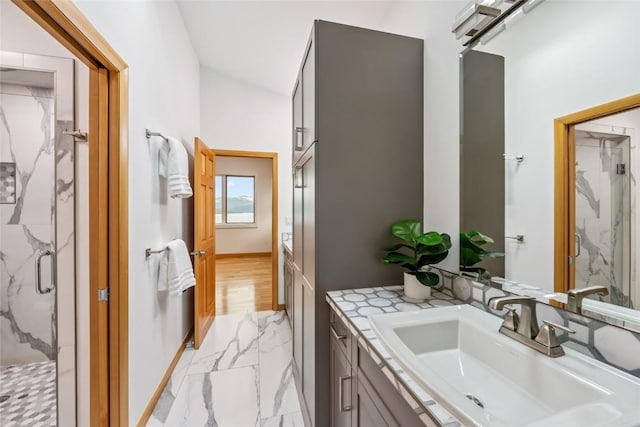 100 Gcr 4104, Granby, CO 80446 - bathroom with marble finish flooring, a marble finish shower, and vanity