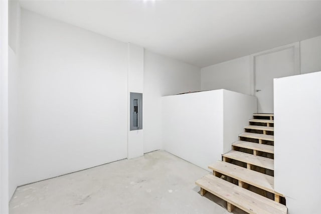 100 Gcr 4104, Granby, CO 80446 - staircase with unfinished concrete flooring and electric panel
