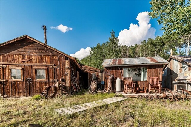 16514 Elkhorn Rd, Como, CO 80432 - back of house featuring an outbuilding