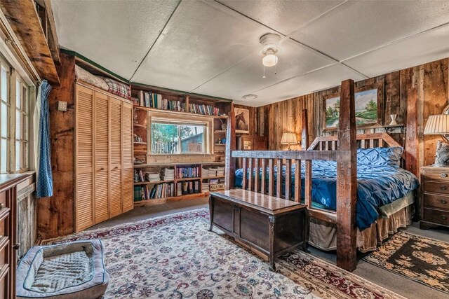 16514 Elkhorn Rd, Como, CO 80432 - bedroom with wooden walls