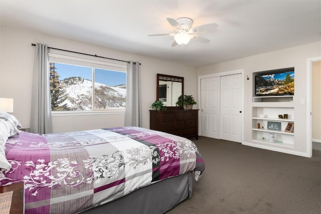 98 Lookout Ridge Dr Unit 98, Dillon, CO 80435 - bedroom with dark carpet, a closet, and ceiling fan