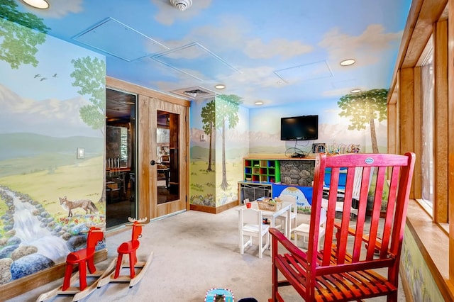 interior space with attic access, carpet, visible vents, and recessed lighting