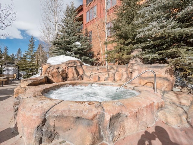 exterior details featuring a jacuzzi