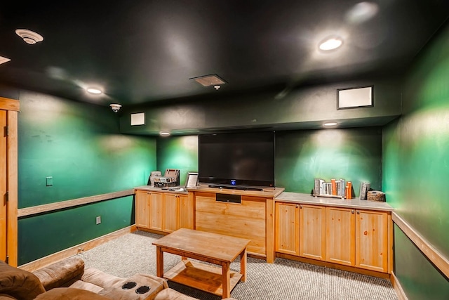 home theater with light carpet, baseboards, and recessed lighting