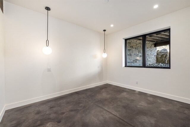 18 Heather Way, Silverthorne, CO 80498 - empty room featuring finished concrete floors, baseboards, and recessed lighting