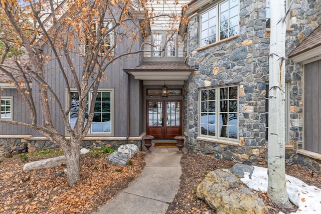 1031 Steamboat Blvd, Steamboat Springs, CO 80487 - entrance to property with french doors and stone siding