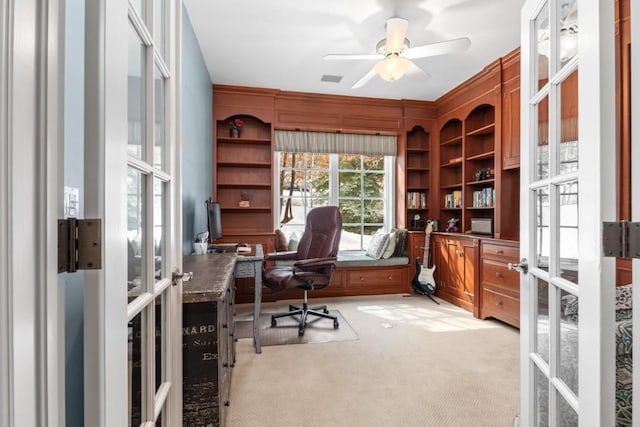 1031 Steamboat Blvd, Steamboat Springs, CO 80487 - office area with french doors, light colored carpet, and ceiling fan