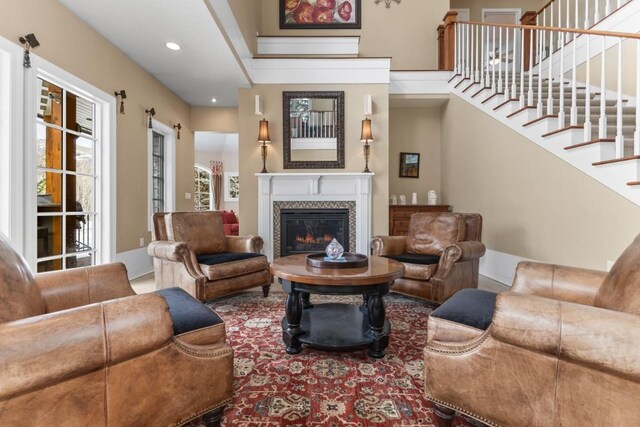 1031 Steamboat Blvd, Steamboat Springs, CO 80487 - dining area featuring wood finished floors, wainscoting, arched walkways, crown molding, and recessed lighting