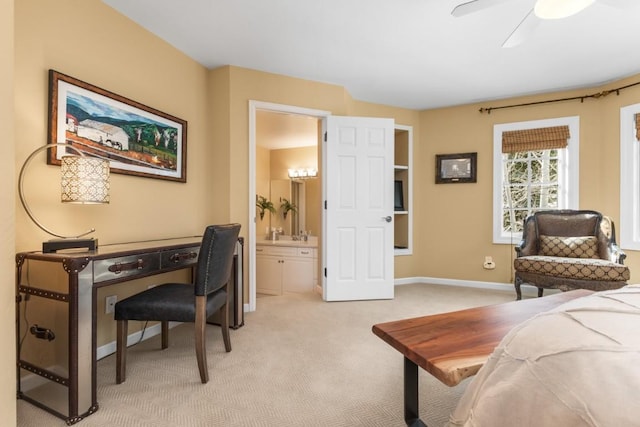 1031 Steamboat Blvd, Steamboat Springs, CO 80487 - bedroom with light carpet, connected bathroom, and ceiling fan