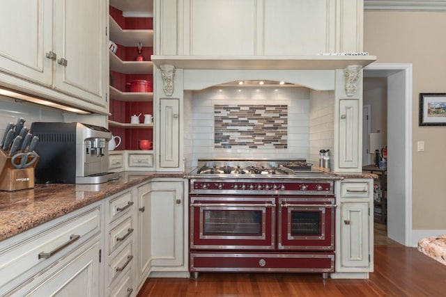 1031 Steamboat Blvd, Steamboat Springs, CO 80487 - kitchen featuring double oven range, open shelves, backsplash, and dark wood finished floors
