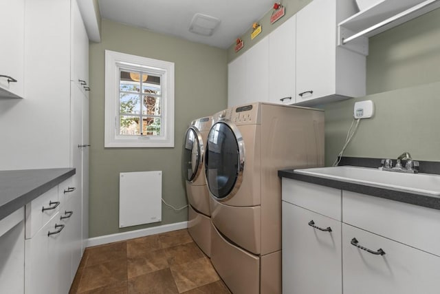 1031 Steamboat Blvd, Steamboat Springs, CO 80487 - washroom featuring washer and dryer and cabinet space