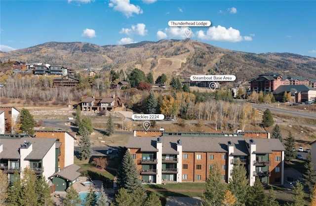 aerial view featuring a residential view and a mountain view