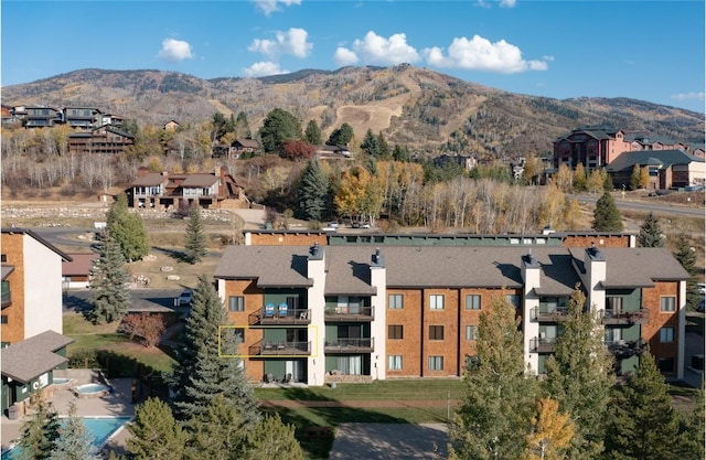 property view of mountains featuring a residential view