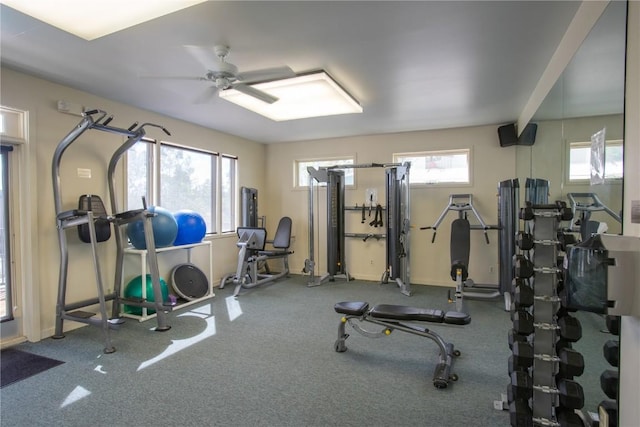 workout room featuring a ceiling fan