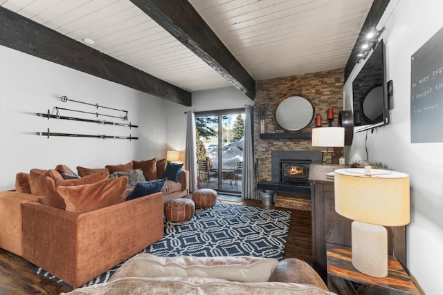 living area featuring beamed ceiling, wooden ceiling, wood finished floors, and a fireplace