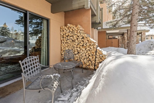 view of snow covered patio