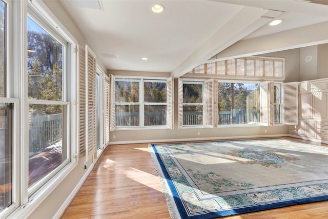 unfurnished sunroom with visible vents