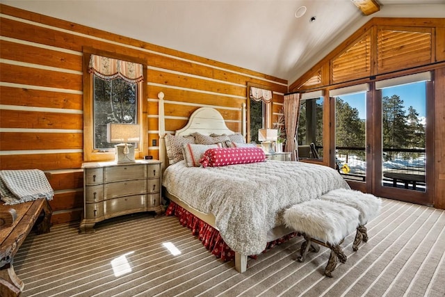 197 Wild Irishman Rd, Keystone, CO 80435 - bedroom featuring access to exterior, carpet floors, wooden walls, and high vaulted ceiling