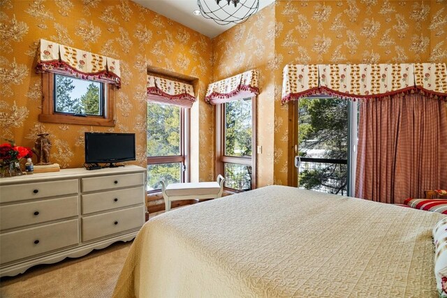 197 Wild Irishman Rd, Keystone, CO 80435 - carpeted bedroom with wallpapered walls