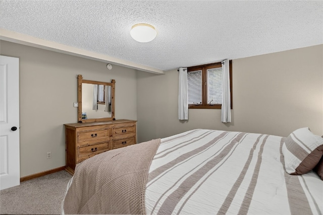 24 Ski Pole Ct, Breckenridge, CO 80424 - bedroom featuring a textured ceiling and carpet floors