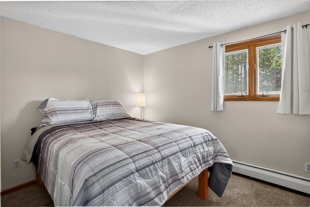 24 Ski Pole Ct, Breckenridge, CO 80424 - carpeted bedroom with baseboard heating and a textured ceiling