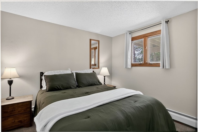 24 Ski Pole Ct, Breckenridge, CO 80424 - bedroom with a baseboard radiator, a textured ceiling, and carpet floors