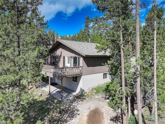 24 Ski Pole Ct, Breckenridge, CO 80424 - view of side of property featuring a deck and a patio