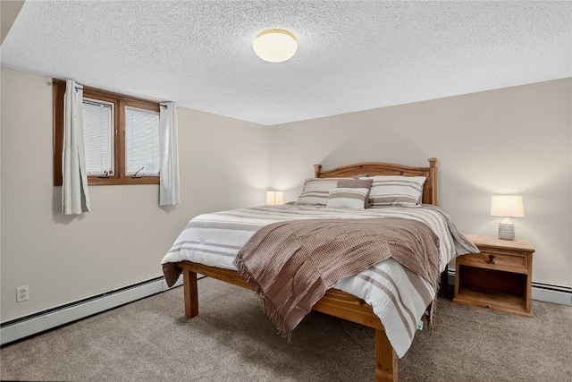 24 Ski Pole Ct, Breckenridge, CO 80424 - bedroom with baseboard heating, carpet floors, and a textured ceiling