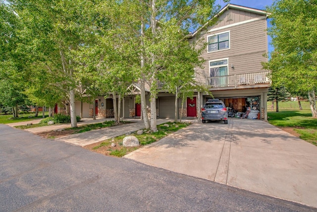 102 Creek Ln Unit 102, Silverthorne, CO 80498 - townhome / multi-family property with driveway, board and batten siding, and a garage