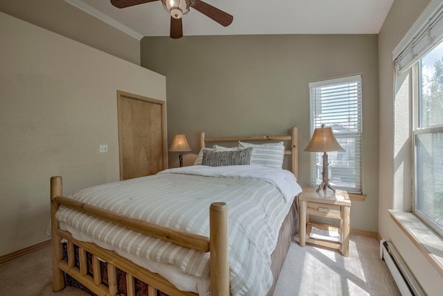 102 Creek Ln Unit 102, Silverthorne, CO 80498 - bedroom with a baseboard heating unit, lofted ceiling, carpet flooring, a closet, and ceiling fan