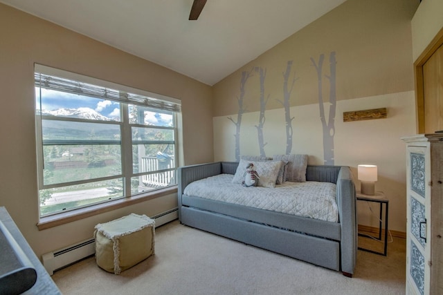 102 Creek Ln Unit 102, Silverthorne, CO 80498 - bedroom with baseboard heating, vaulted ceiling, carpet flooring, and ceiling fan