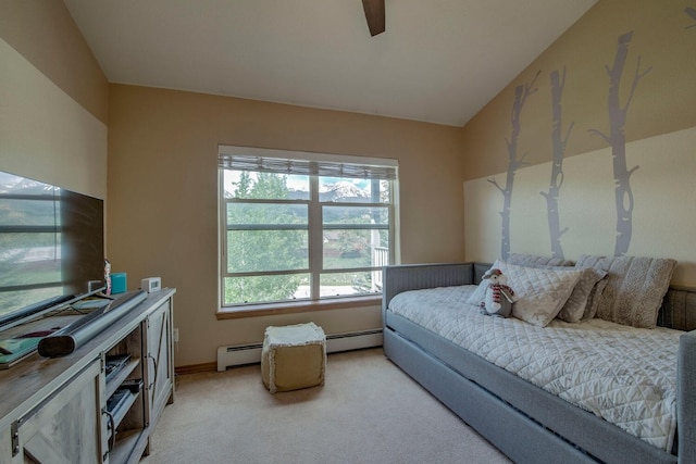 102 Creek Ln Unit 102, Silverthorne, CO 80498 - bedroom featuring light colored carpet, lofted ceiling, a baseboard heating unit, and ceiling fan