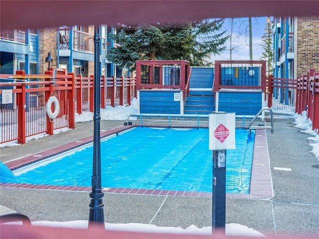 pool featuring fence