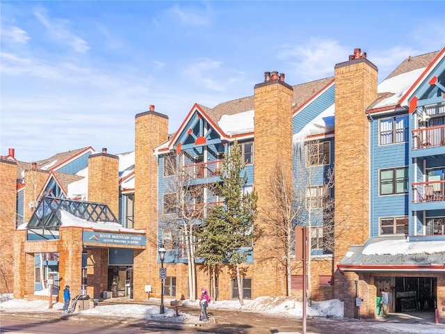 100 S Park Ave Unit E117, Breckenridge, CO 80424 - view of snow covered building