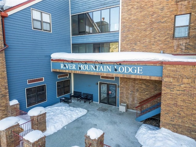 view of snow covered property