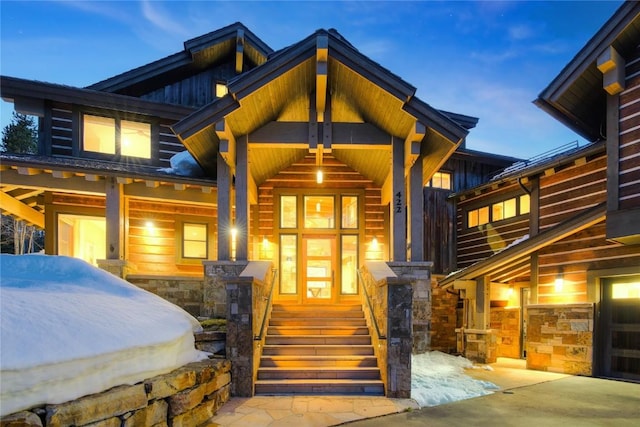 422 Timber Trail Rd, Breckenridge, CO 80424 - view of front of property featuring board and batten siding, a porch, and stone siding