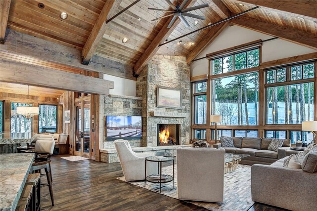 422 Timber Trail Rd, Breckenridge, CO 80424 - living area featuring beamed ceiling, high vaulted ceiling, dark wood-style floors, and wood ceiling