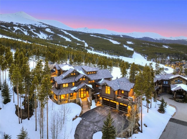 422 Timber Trail Rd, Breckenridge, CO 80424 - snowy aerial view with a view of trees and a mountain view