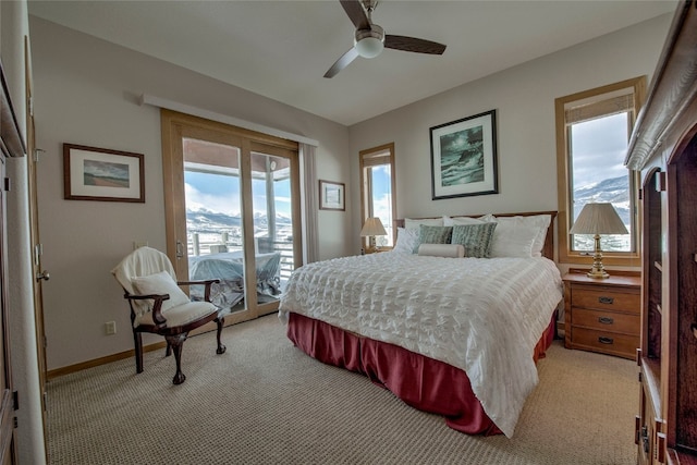 1235 Elk Run Rd, Silverthorne, CO 80498 - bedroom featuring light colored carpet, access to outside, ceiling fan, and baseboards