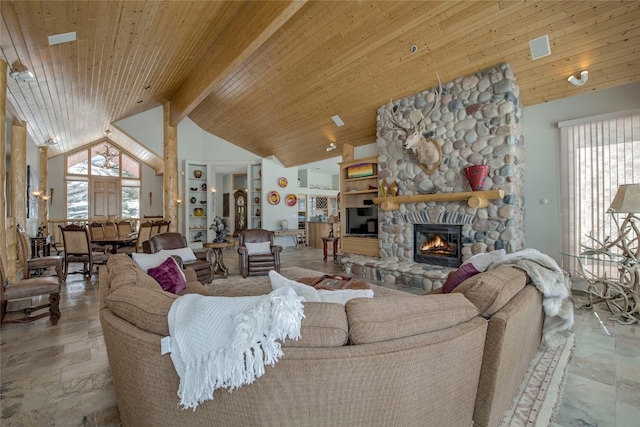1235 Elk Run Rd, Silverthorne, CO 80498 - living area featuring stone tile floors, wooden ceiling with exposed beams, high vaulted ceiling, and a fireplace