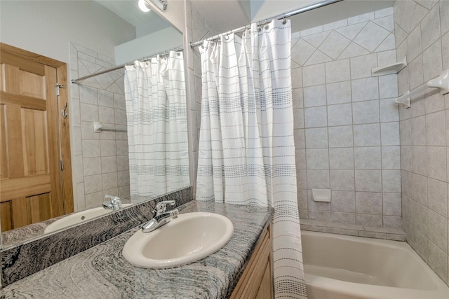 1235 Elk Run Rd, Silverthorne, CO 80498 - bathroom featuring vanity and shower / tub combo