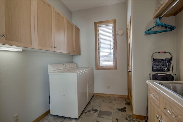 1235 Elk Run Rd, Silverthorne, CO 80498 - laundry room with washer and dryer, cabinet space, and baseboards