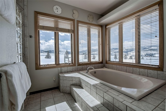 1235 Elk Run Rd, Silverthorne, CO 80498 - bathroom featuring a garden tub and tile patterned flooring