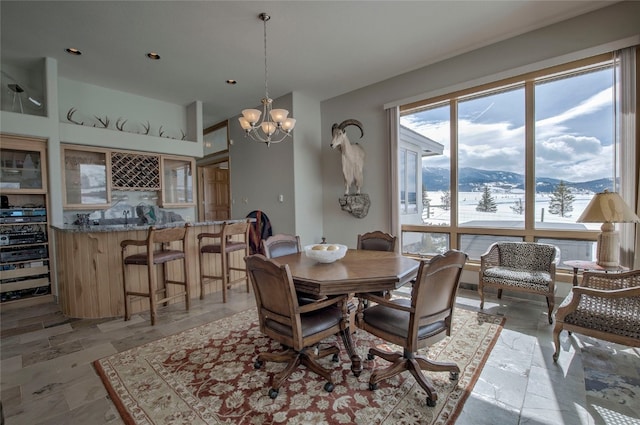 1235 Elk Run Rd, Silverthorne, CO 80498 - dining space with a mountain view, a chandelier, and recessed lighting