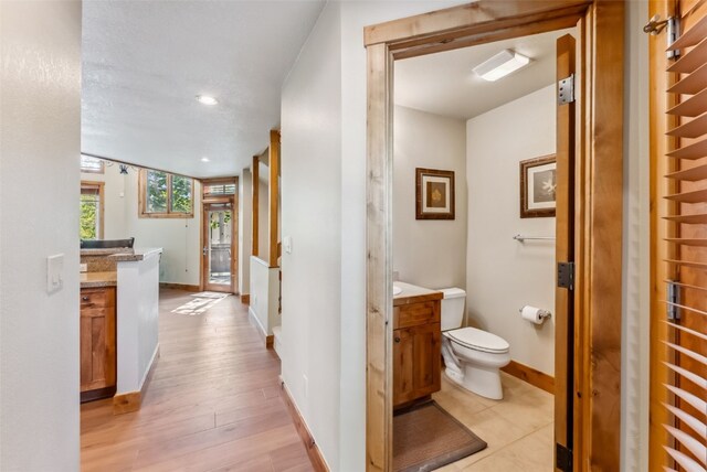 24 Rasor Dr Unit 24, Keystone, CO 80435 - bathroom featuring vanity, wood finished floors, and recessed lighting