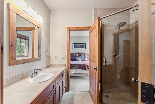 24 Rasor Dr Unit 24, Keystone, CO 80435 - full bath with vanity, ensuite bathroom, a shower stall, and tile patterned floors