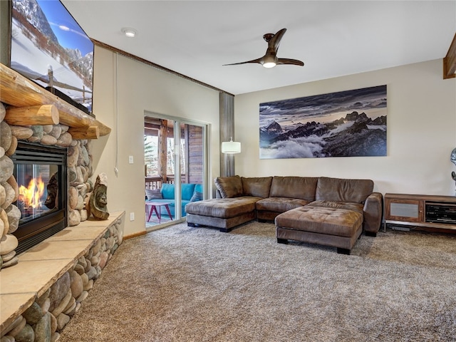60 Lookout Ridge Dr, Dillon, CO 80435 - carpeted living room featuring a ceiling fan and a stone fireplace